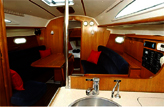 Saloon of the Jeanneau 32, self charter sailing Whitsundays holiday.